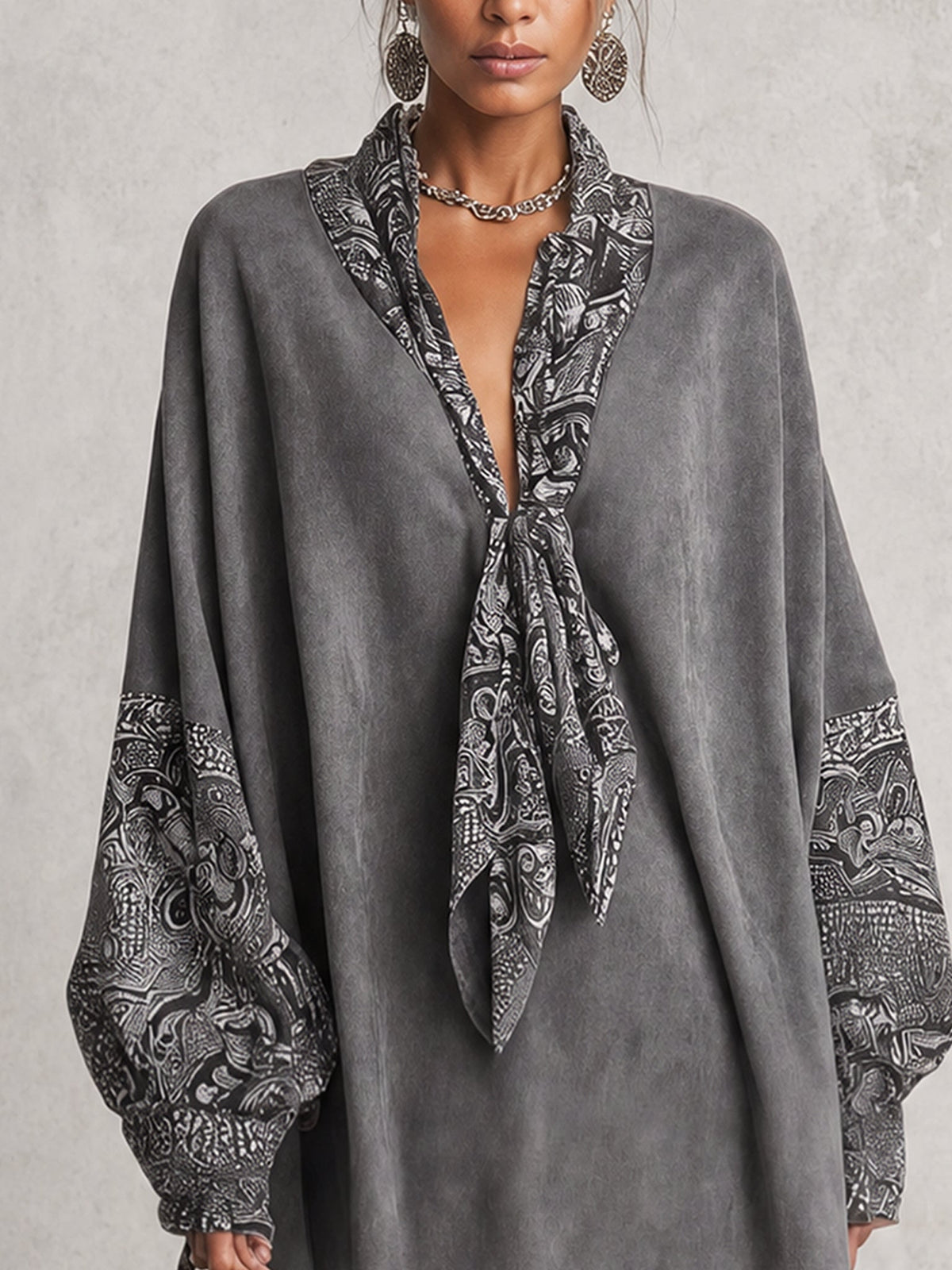 Grey V-neck printed mini dress with faux suede panels